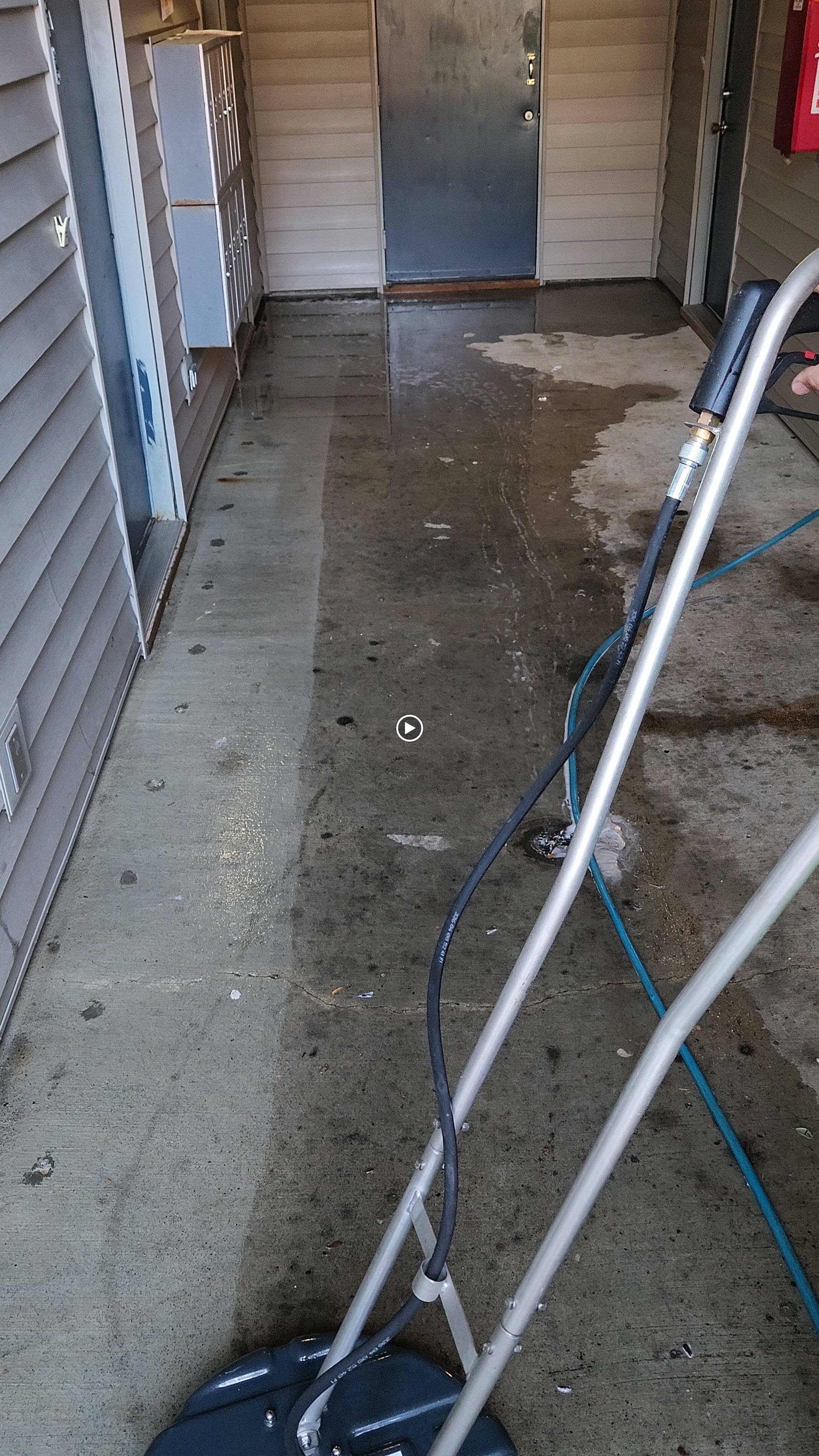 Video preview showing surface-cleaning equipment in an entryway