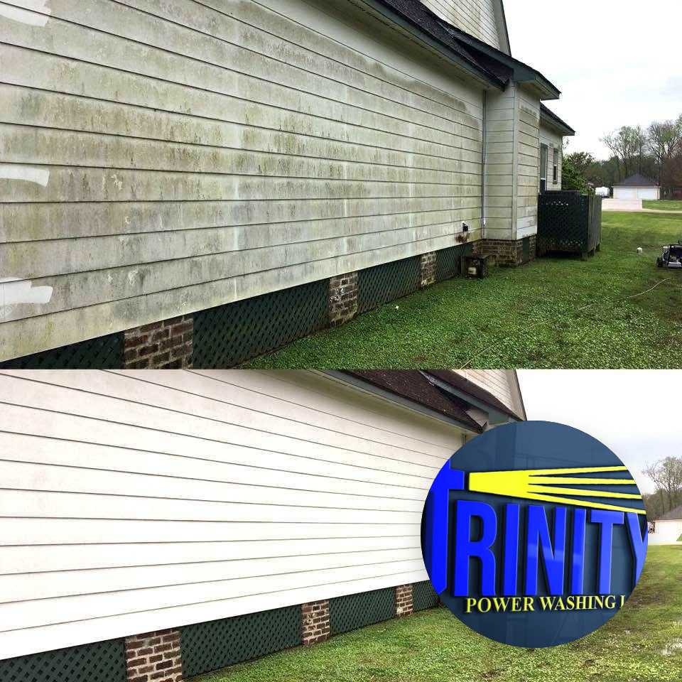 House siding before washing, with green buildup, and after cleaning